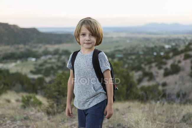 4 year old boy hiking at sunset, Lamy, NM — Stock Photo