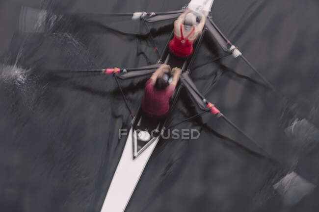 Overhead view of a double scull pair rowing together, two people. — Stock Photo