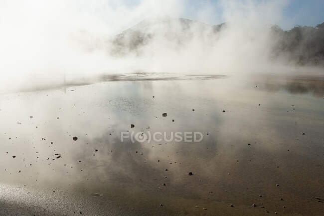 Thermal pools with mist rising from the heated water pools — Stock Photo