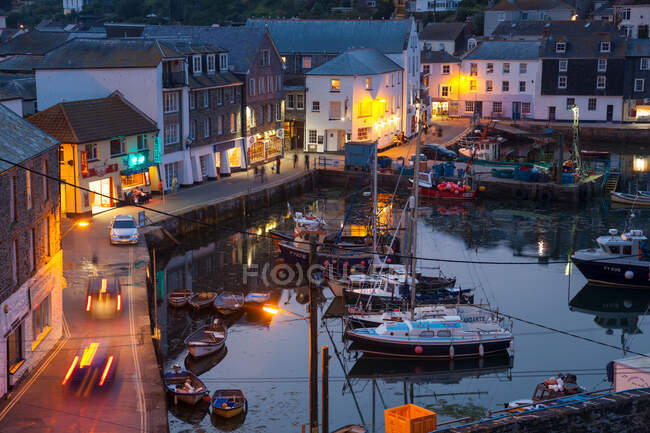 High angle view of boats moored in the harbour at dusk — Stock Photo