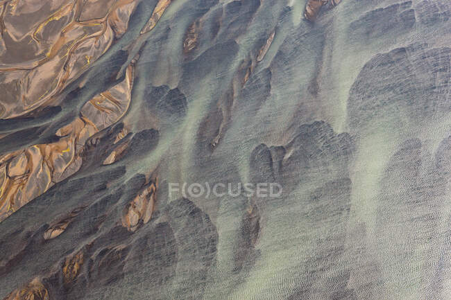 Veduta aerea del fiume Hosa colorato da fusione glaciale, SW Islanda — Foto stock