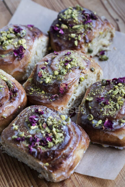 High angle close up of freshly baked Danish Pastries with Pistachio Nuts. — Stock Photo