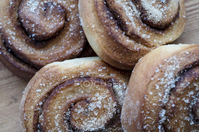 High angle close up of freshly baked cinnamon rolls. — Stock Photo