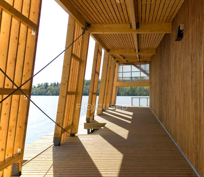Exterior porch of wooden boathouse on river or waterfront. — Stock Photo