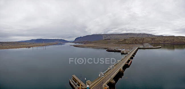 Bridge over water dam in rural area — Stock Photo