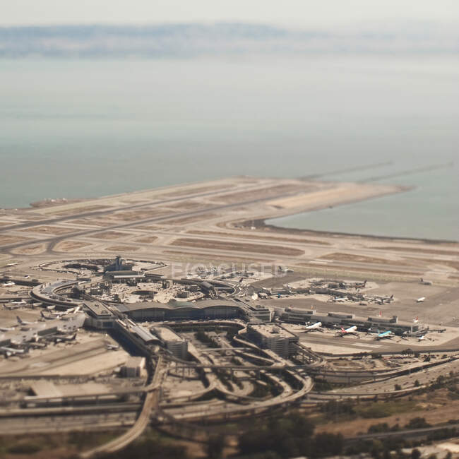 Airport next to ocean, aerial view — Stock Photo