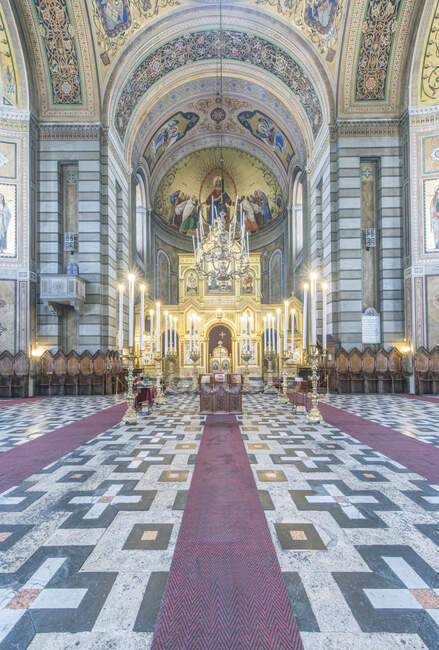 Interior view of the aisle of the Serbian Orthodox church Saint Spyridon Church, Trieste, Italy. — Stock Photo