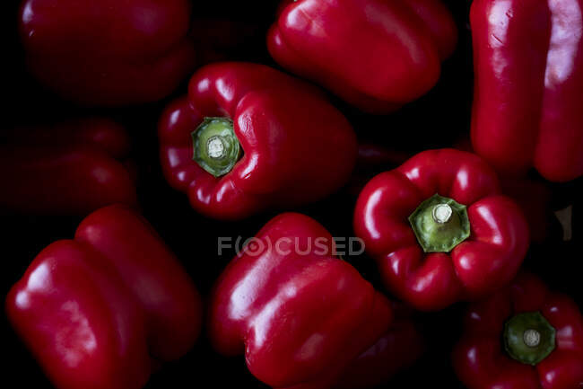 High angle close up of freshly picked red peppers. — Stock Photo