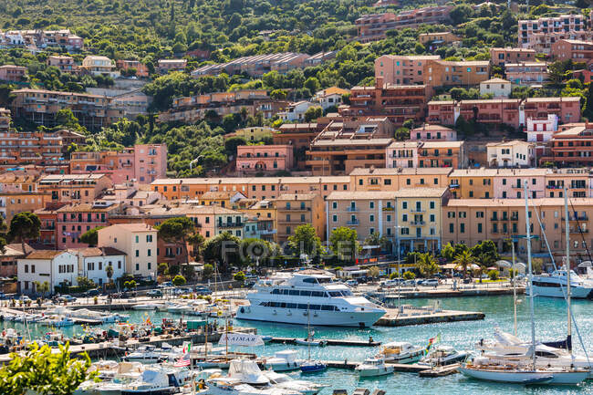Porto Santo Stefano on Monte Argentario, harbour with boats moored. — Stock Photo