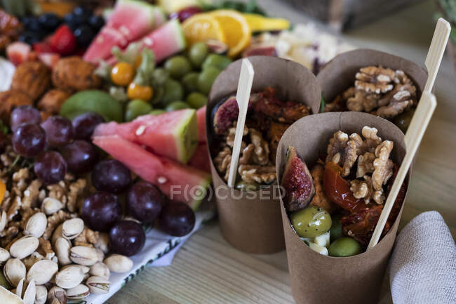 High angle close up of selection of finger foods for a woodland naming ceremony. — Stock Photo