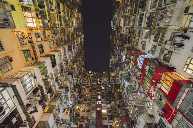 Low angle view of balconies and windows of Monster Building in Quarry Bay. — Stock Photo