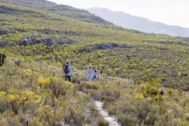 Family hiking a nature trail, Phillipskop nature reserve, Stanford, South Africa. — Stock Photo