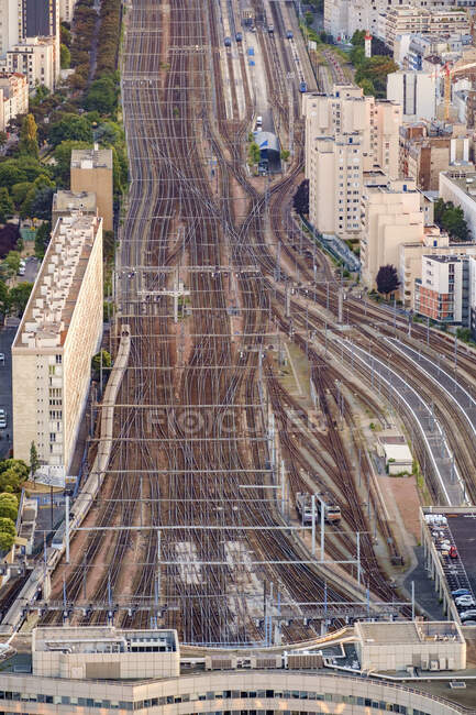 Aerial view of multiple train tracks running into Paris. — Stock Photo