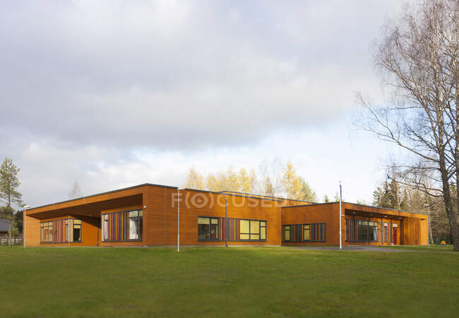 A modern pre-school or day care nursery, open space and grass. — Stock Photo