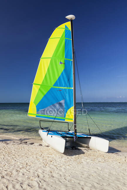 Catamaran sailing boat on the beach — Stock Photo