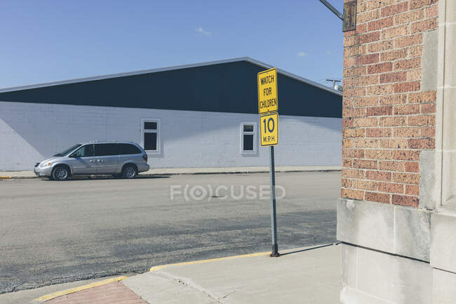 Watch For Children sign, on a street at an intersection. — Stock Photo