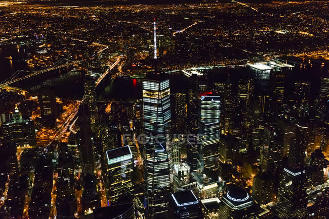 The city of New York City, Manhattan, aerial view at night. - foto de stock