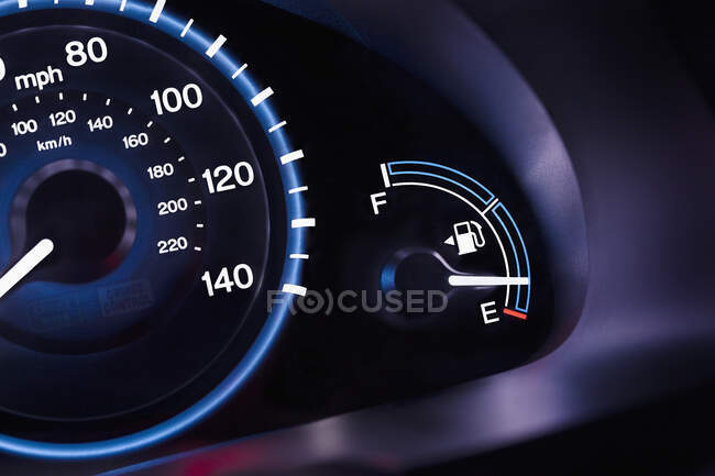 A car interior, the dashboard,instrument panel,and fuel gauge. A speedometer. — Photo de stock