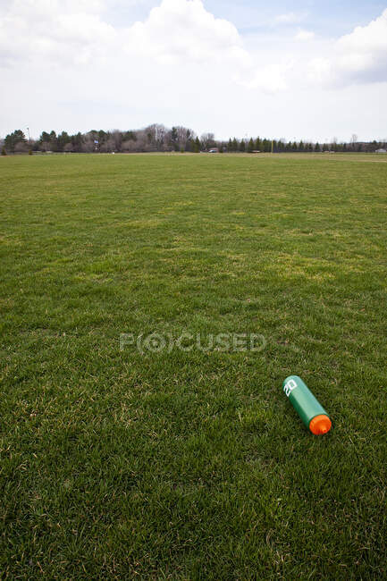 A Water Bottle on a Sports Field — Stock Photo