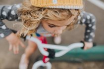 Girl riding on bicycle — Stock Photo