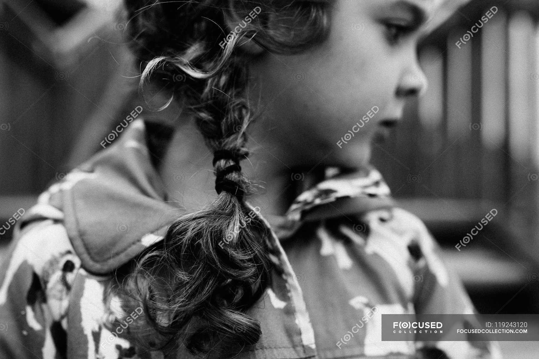 Little Girl With Curly Hair Side View One Person Stock Photo