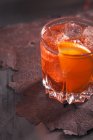 Glass of vermouth with ice and orange — Stock Photo