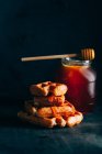 Belgian waffles with honey — Stock Photo