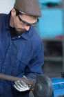 Craftsman working with metal — Stock Photo