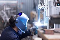 Craftsman working with welding machine — Stock Photo