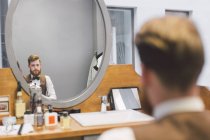Bearded hipster in barbershop — Stock Photo