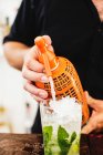 Bartender preparing Mojito — Stock Photo