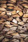 Chopped firewood logs in pile — Stock Photo