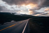 Paved highway in plain — Stock Photo