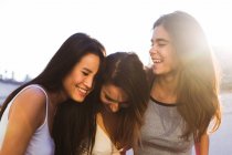 Three women laughing — Stock Photo