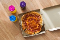 Pizza and three jars with drink — Stock Photo