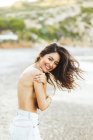 Topless girl looking over shoulder — Stock Photo