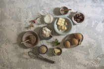 Directly above view sweet ingredients arranged on stone table — Stock Photo