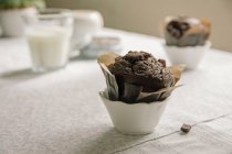 Chocolate muffin on table — Stock Photo