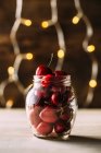 Jar with cherry on counter — Stock Photo