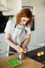 Rude woman cooking — Stock Photo