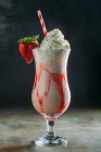 Strawberry smoothie on dark — Stock Photo