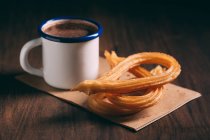Chocolate with churros, typical spanishn pastry — Stock Photo