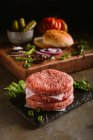 Raw ingredients for a gourmet burger — Stock Photo