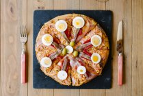 Tasty pizza on table — Stock Photo