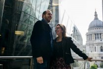 Man and woman in city — Stock Photo