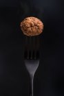 Fork with delicious meatball — Stock Photo