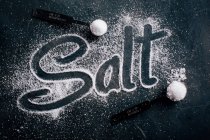 Salt and the word Salt — Stock Photo