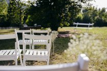 Chairs in garden — Stock Photo