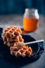 Waffles in grid with icing sugar — Stock Photo