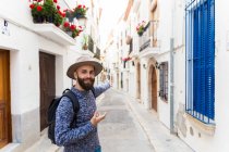 Young male traveler outdoors — Stock Photo